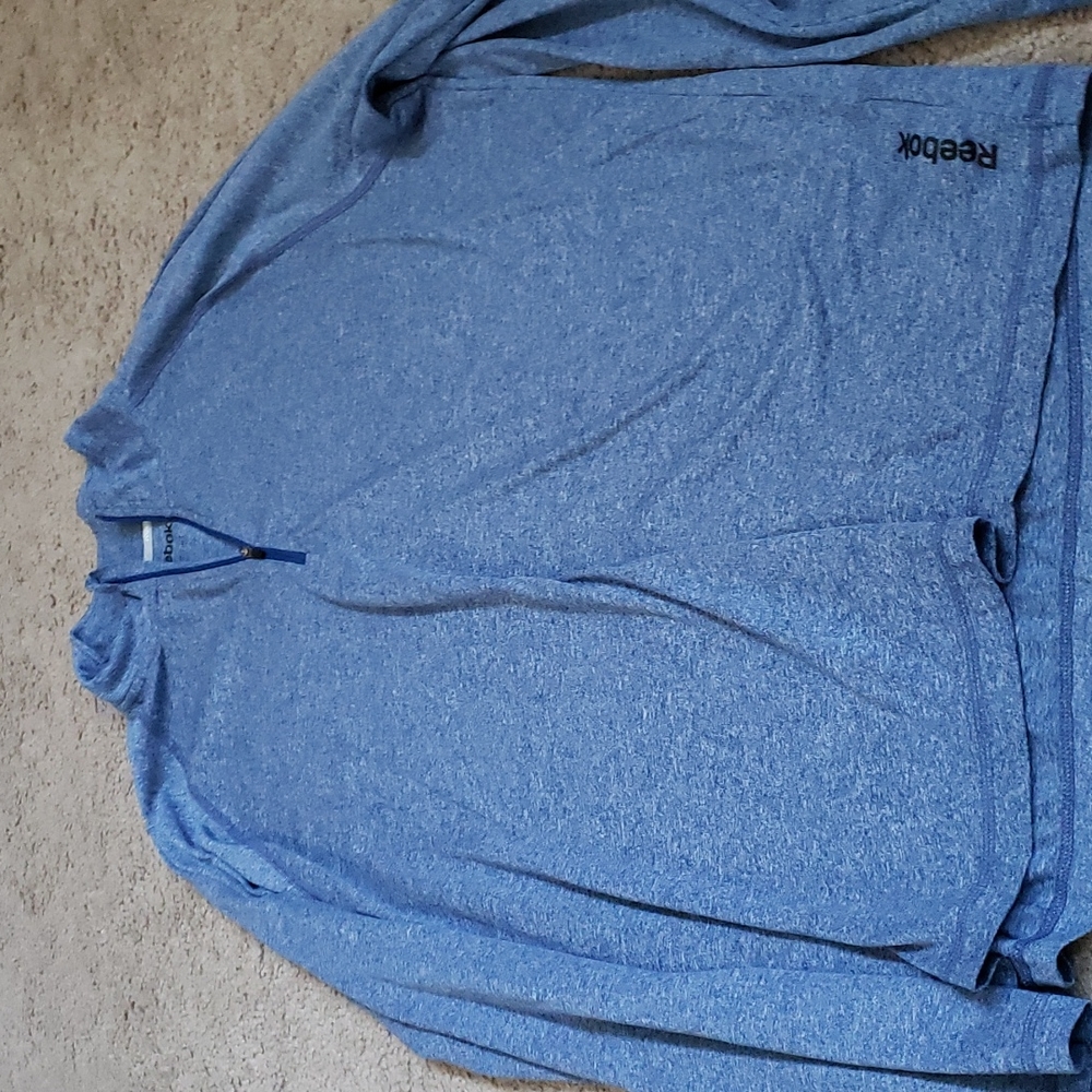 Reebok  half zip size large